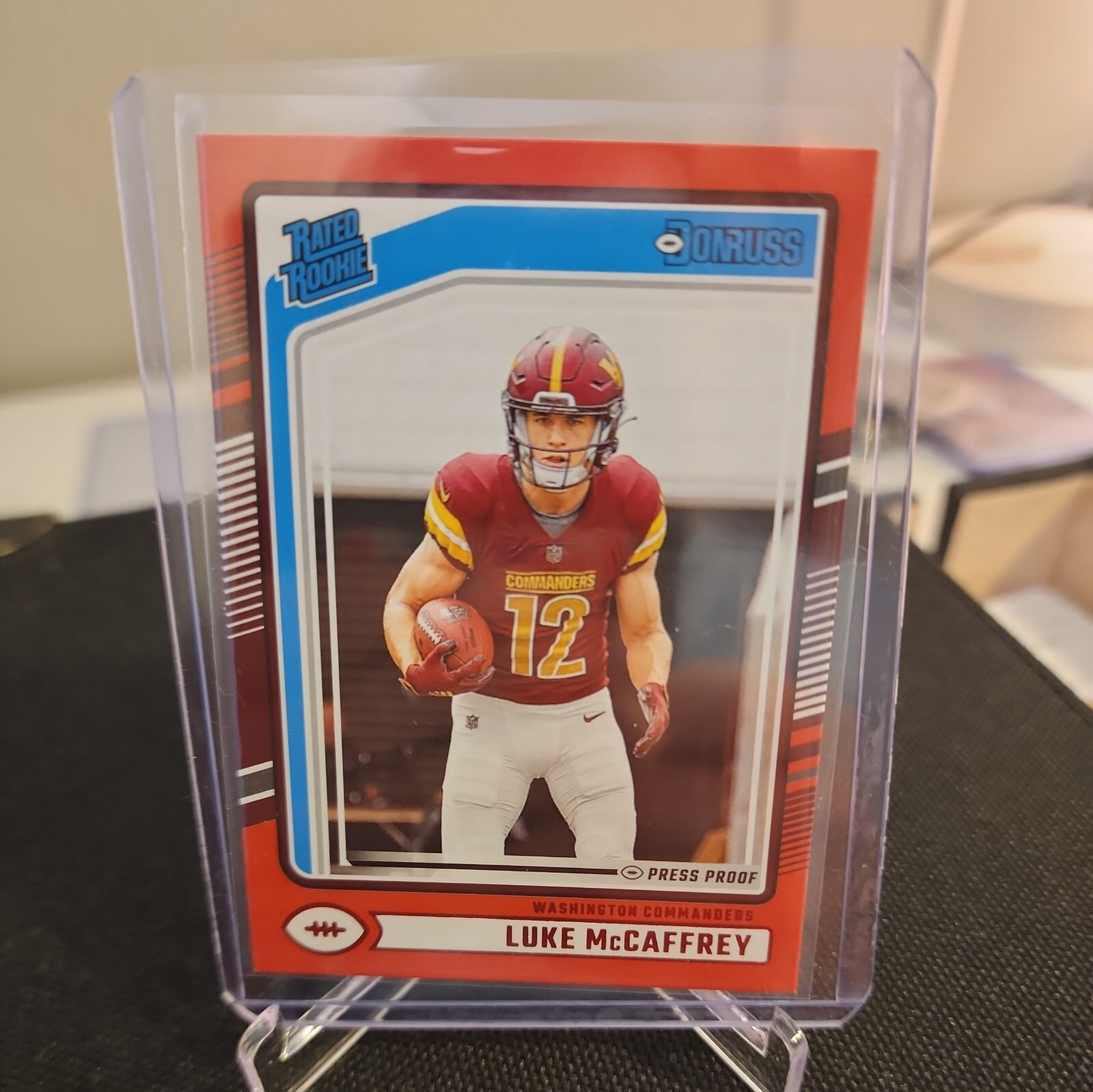 2024 Panini Donruss - Rated Rookie Red Press Proof #302 Luke McCaffrey (RC)