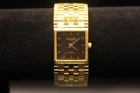 Vintage Seiko Men’s Gold Tone Quartz Rectangular Tank Black & Gold Watch