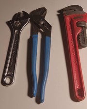 set of three Plumbing tools 420channel locks 8in cresent wrench10 in pipe wrench