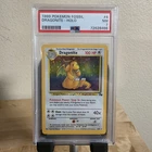 Pokémon Dragonite 4/62  1999 Fossil Holo PSA 7 NM
