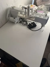 Long Arm Quilting Machine On Table