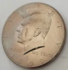 2009 P Kennedy Circulated half dollar coin. NIFC, Low Mintage: 1,900,000 - Toned