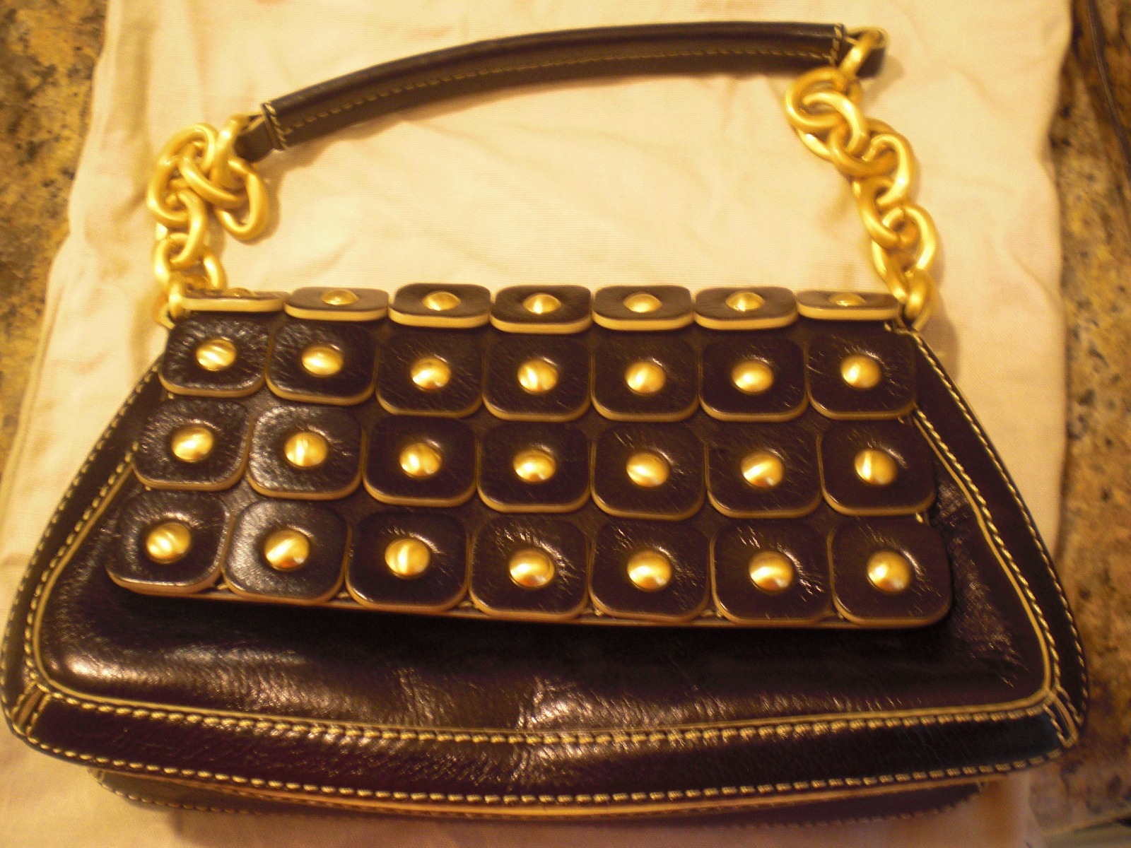Maxx New York Black Leather Studded Handbag with Gold Hardware