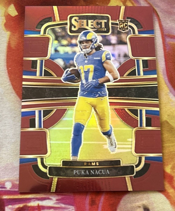 Puka Nacua 2023 Panini Select Concourse #56 Maroon Prizm /149 (RC) RAMS