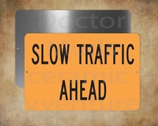 SLOW TRAFFIC AHEAD 8" x 12" metal sign Made in USA