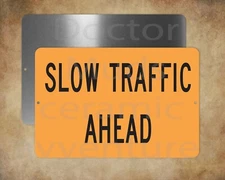 SLOW TRAFFIC AHEAD  8" x 12" metal sign Made in USA