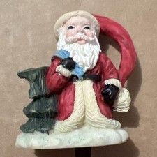 Small resin santa 2 inches tall