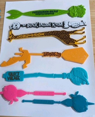 Lot of 7 Tiki Swizzle Sticks Rare Longitude Bootlegger Shrunken Head