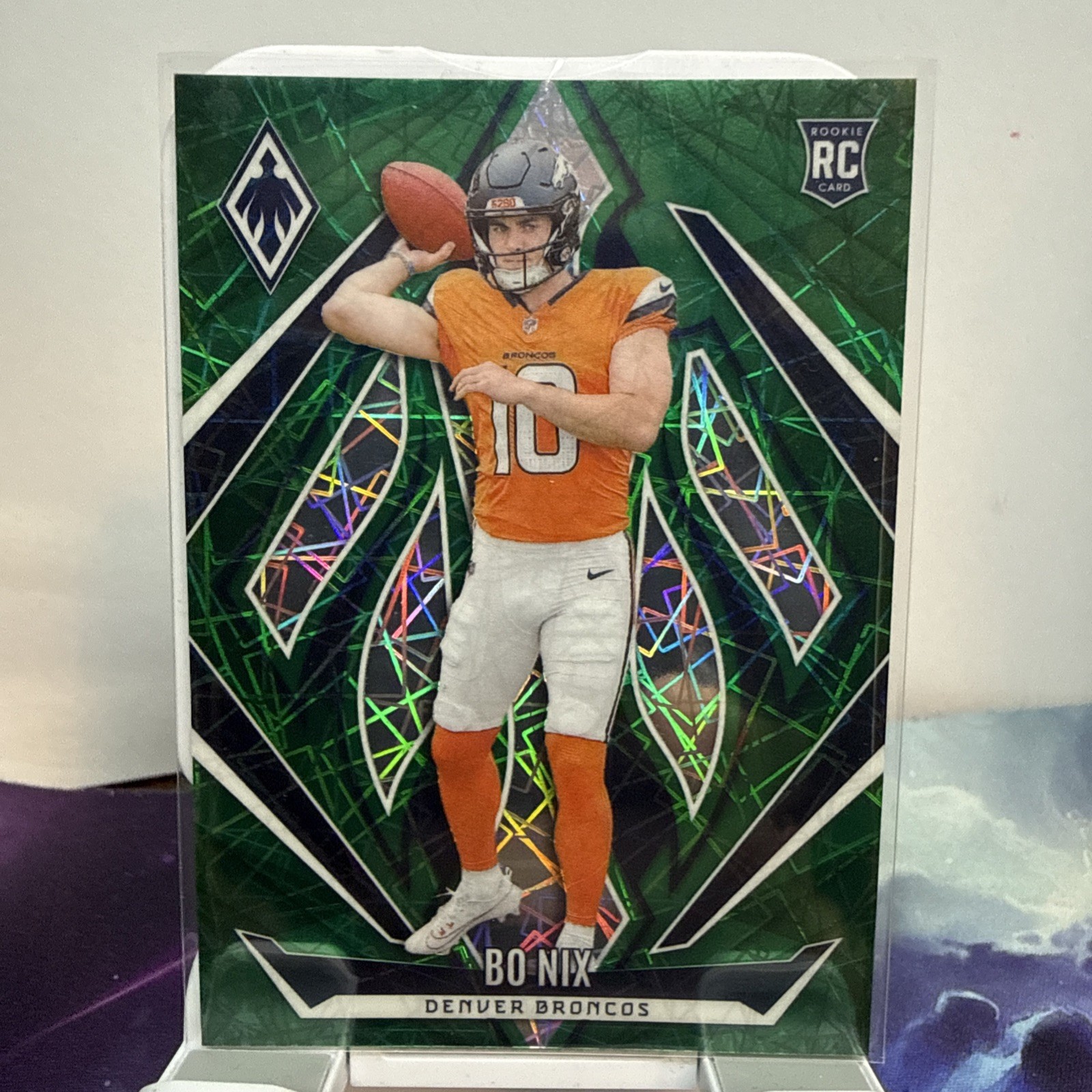 2024 Panini Phoenix - Rookies Bo Nix #159 Green Lazer /50 (RC)