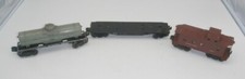 Lot Of 3 Lionel Train Car - Tank Car, 6844 Flat Car  6017 Caboose