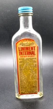 4.5 Fl Oz Rawleigh's Liniment Internal For Man or Beast w Blue Metal Cap 6" Tall