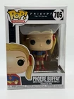 Funko- Friends - Phoebe Buffay (Supergirl)- #705 - Yellow Paint Mark On Plastic