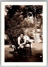 Vtg B&W Snapshot Smiling Woman Rocking Chair Outdoors Lake Trees 1930s