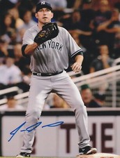 IKE DAVIS NEW YORK YANKEES  ACTION SIGNED 8x10
