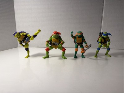 Teenage Mutant Ninja Turtles 4 Figure Lot TMNT Leonardo Raphael Donatello Michel