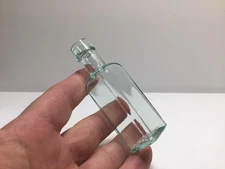 Small Antique Aqua Sample Size Sauce Bottle.