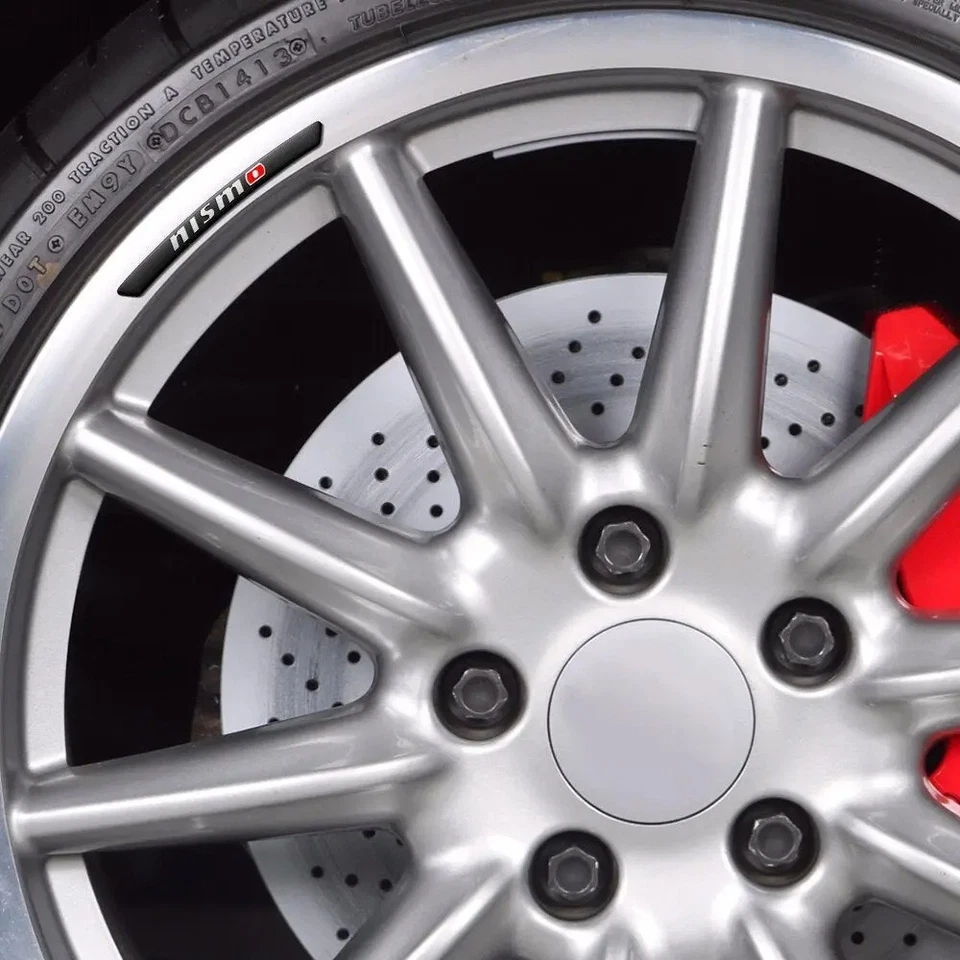  Pegatina de llanta de rueda aplicable a Nissan negra Foto 3 de 4