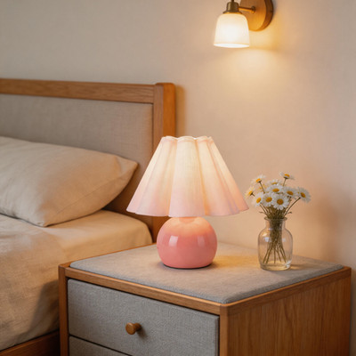Pink table lamp with beige shade ideal for stylish dressing tables.