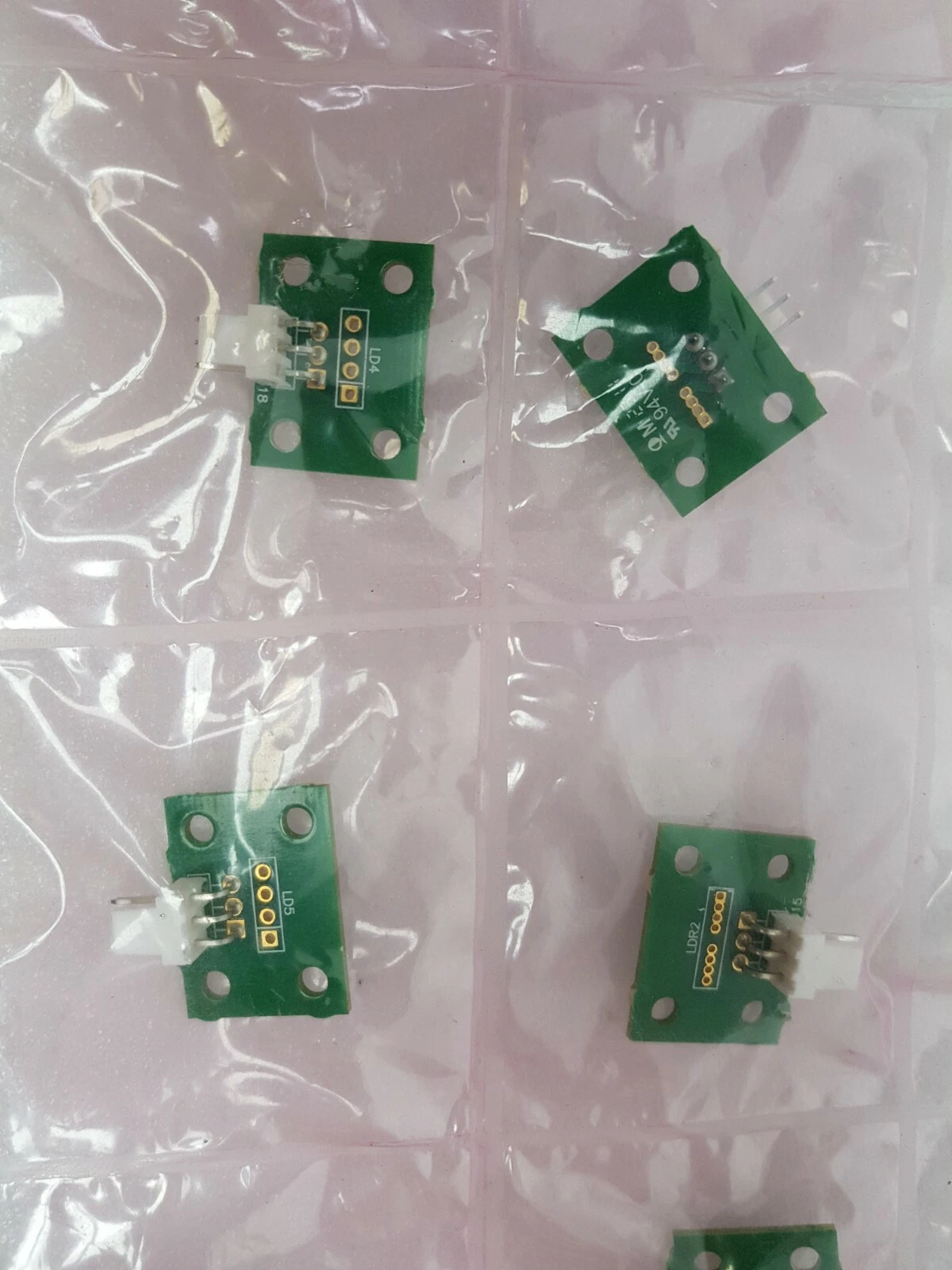 Small green boards marked LD4, LD5 and LDR2 with 3-pin connectors in an anti-static bag