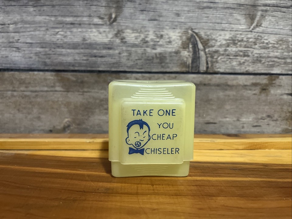 A vintage metal cigarette case with a built-in match holder and a cheeky 'Take One You Cheap Chiseler' engraving — a perfectly snarky mid-century novelty.