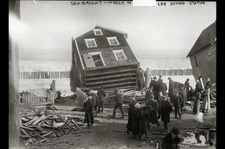 Seabright -- Wreck of life saving station,January 6,1914,tipped over house,NJ