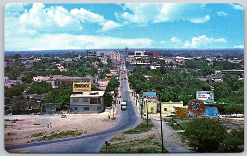 Postcard Mexico Tamaulipas Ciudad Victoria Nescafe Bacardi Coca Cola Signs - Imagen 1 de 2