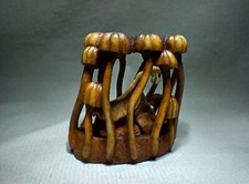 Netsuke "Autumn surrounded by mushrooms"  Deer horn, boxwood, amber, netske