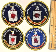 Four different C-I-A Cen-tral Intelli-gence Age-ncy patches