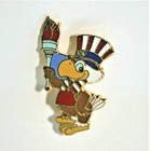 LA 1984 SAM THE EAGLE OLYMPIC MASCOT TORCH PIN - CROSS HATCH CLOSURE — photo 1