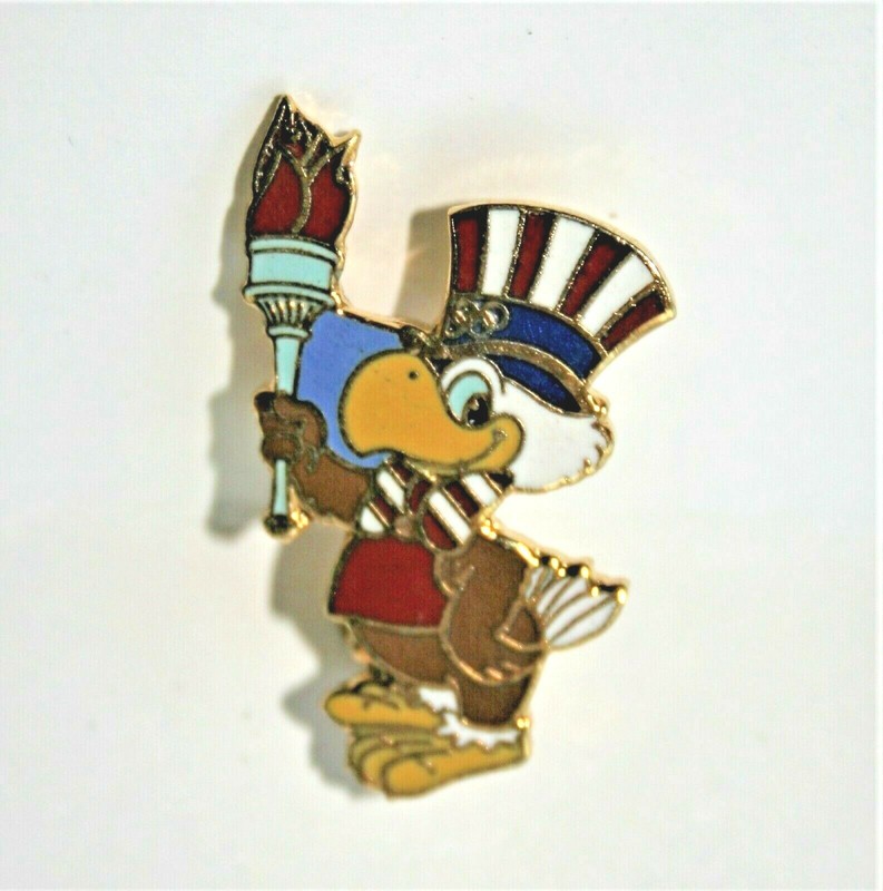 LA 1984 SAM THE EAGLE OLYMPIC MASCOT TORCH PIN - CROSS HATCH CLOSURE