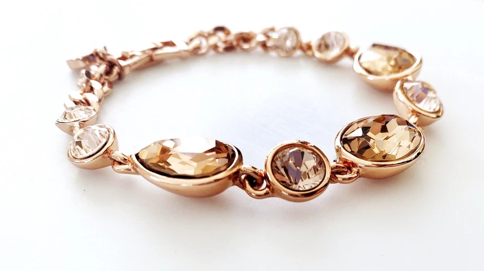 Pulsera de cristal de oro rosa Givenchy.  Champagne y piedras transparentes. Foto 4 de 4