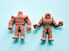 Two 1980s M.U.S.C.L.E. Men Small Toy Figures