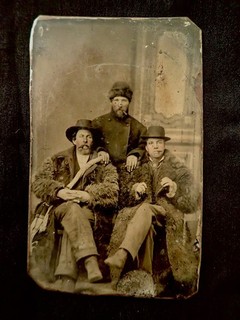 CIRCA 1870S TINTYPE THREE ROUGH LOOKING FRONTIERSMEN CIGARS BUFFALO COATS