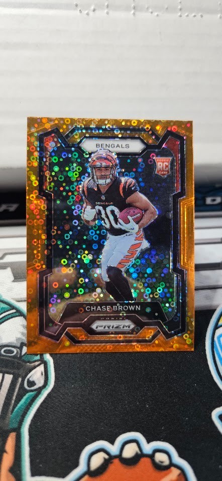2023 Panini Prizm Football Orange Disco Prizm Rookie Chase Brown #318 RC 