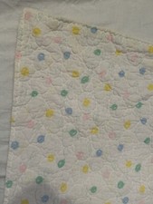 Vintage baby blanket quilted with balloons