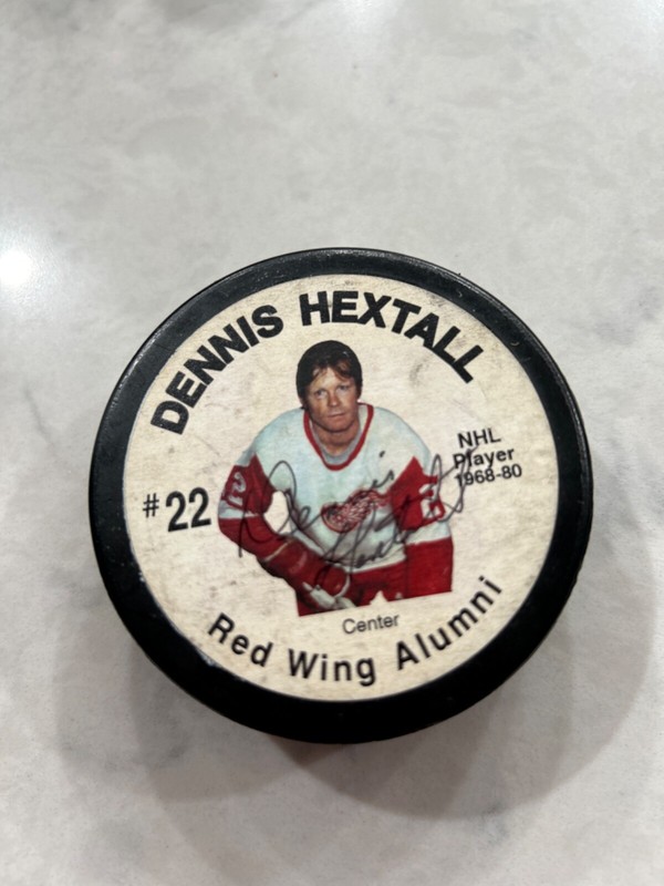 Dennis Hextall autographed Red Wing Alumni puck