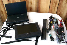 "Polaroid DPA-08055D Two Screen Portable 8" Screens Dvd Player Bundle" Works