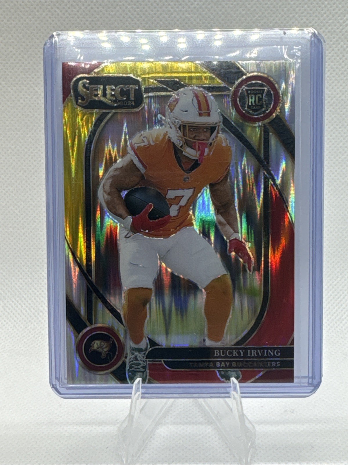 2024 Panini Select - Club Level Bucky Irving #239 Red & Yellow Shock Prizm (RC)