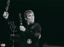 IAN BROWN SIGNED 16x12 STONE ROSES PHOTOGRAPH (ACG CERT AG18776)