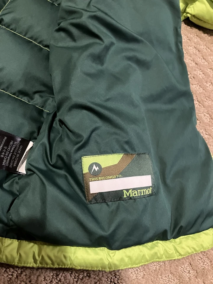 Chaqueta acolchada de plumón Marmot juvenil talla XL 700 relleno bolsillos con cremallera completa usada en excelente estado Foto 4 de 4