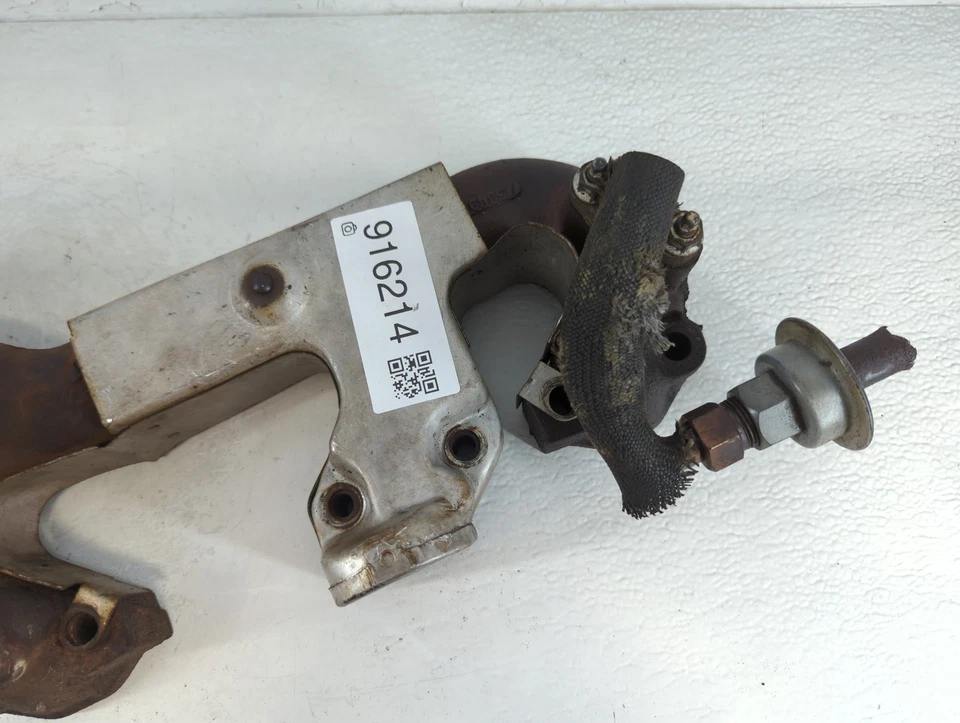 Colector de escape turbocompresor Mitsubishi Eclipse 1995 con turbocompresor XHC5B Foto 2 de 4