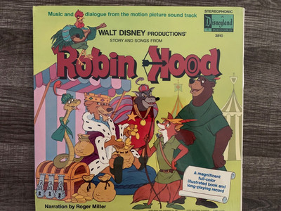 Walt Disney Robin Hood.  Sealed.  Corner dings.  Full color book and record.