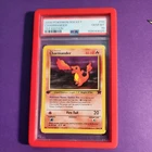 2000 POKEMON ROCKET 1ST EDITION #50 CHARMANDER PSA 10 with Red Dragonscale Guard