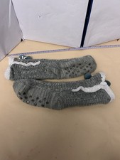 One sized Youth gray knit socks with grips with green ball socks