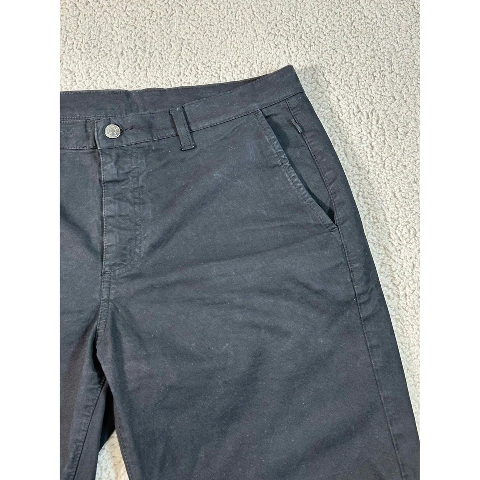 Pantalones cortos chinos informales negros Oakley para hombre talla 32 Foto 3 de 4