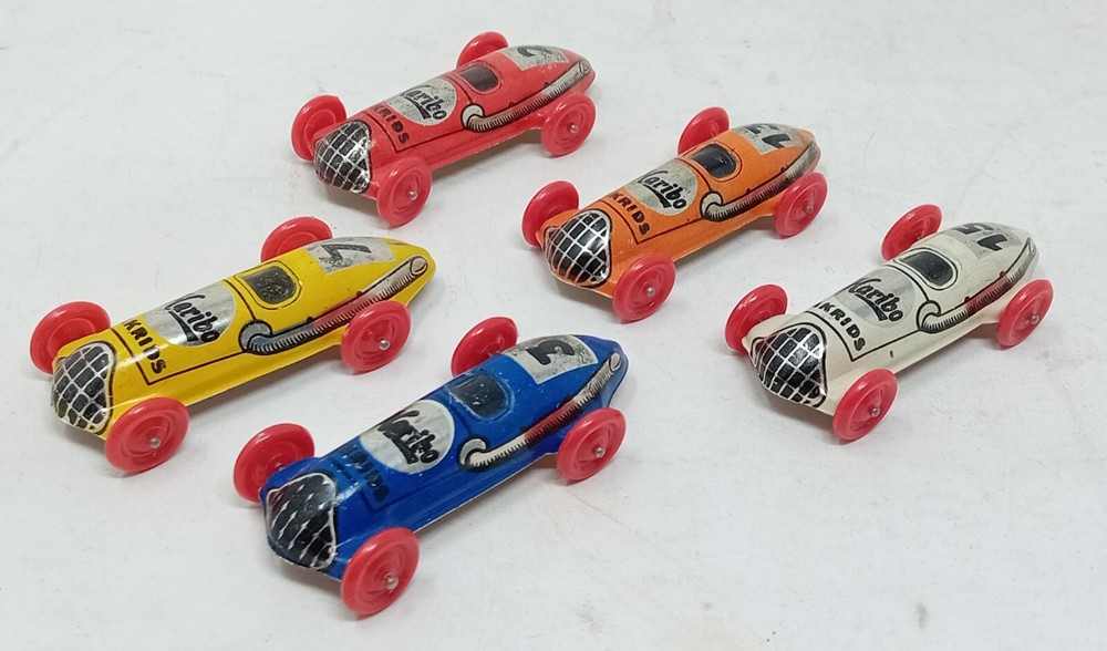 Five 1950's Haribo Lakrids advertising tin penny toy type Racing Cars