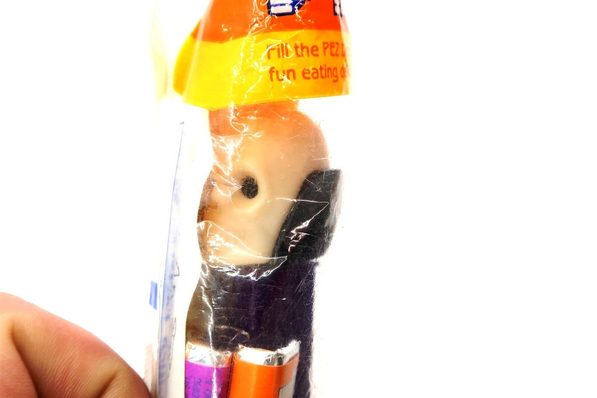 Vintage PEZ Skull NEW IN PACKAGE With Feet ~ Purple, White and