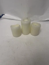 3 white pillar candles slightly burnt unbranded