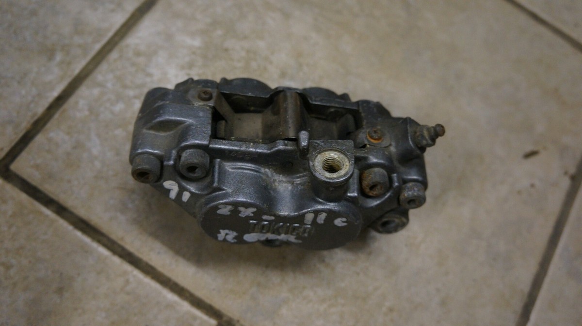 れおページ 1990 90 KAWASAKI NINJA ZX1100D REAR BRAKE CALIPER OEM 43041-1800
