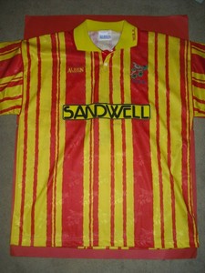 wba red and yellow kit